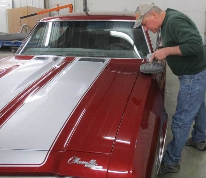 A worker doing auto dent repair in Yorkville, IL